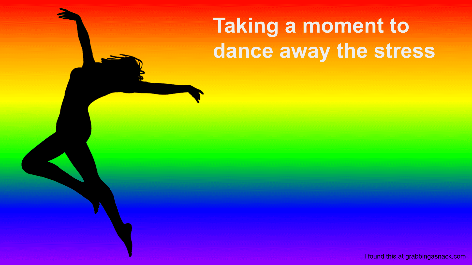 Carefree woman dancing on a rainbow background